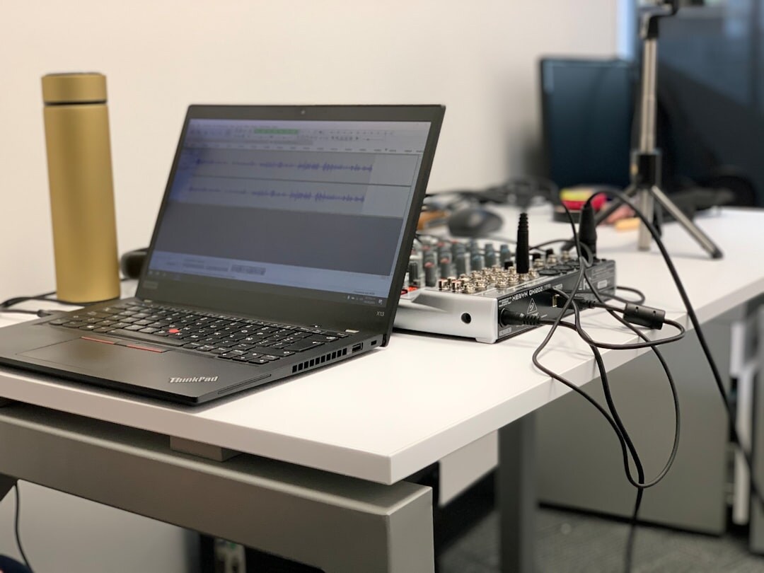 Podcast studio with microphones and a mixing console