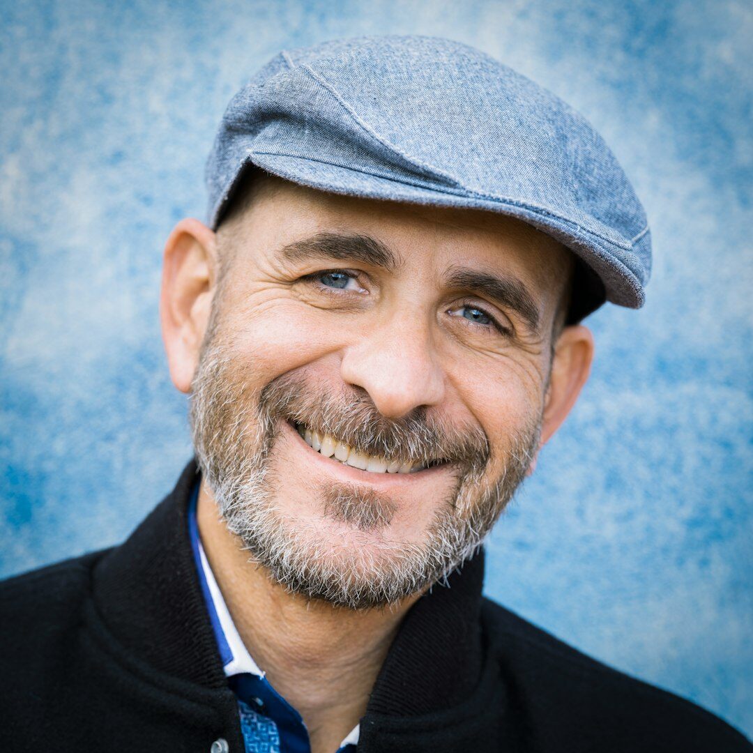 Portrait of a smiling South African man listener