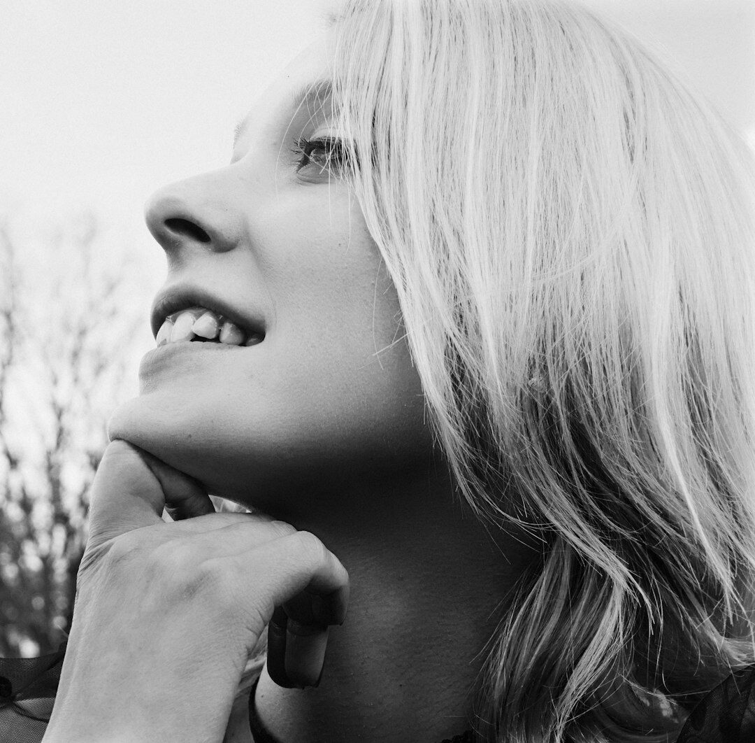 Portrait of a smiling South African woman listener